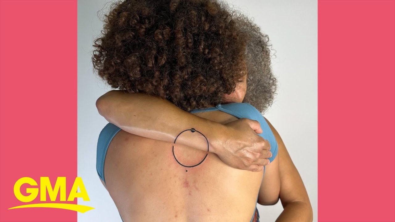 Mother-daughter tattoo connects when they hug