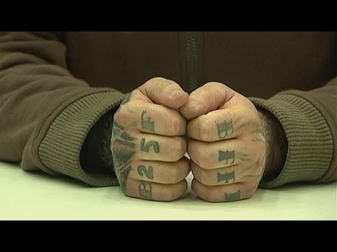 German politician loses appeal against jail term for 'Holocaust' tattoo